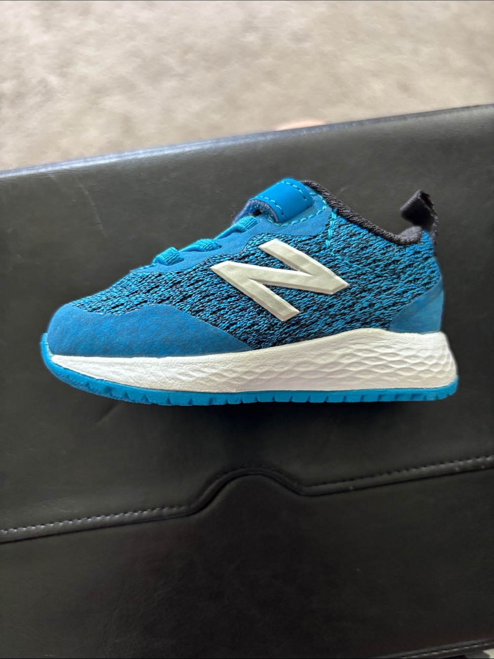 New Balance Kids Blue Athletic Sneaker with White Logo